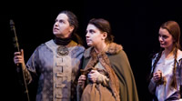 Polonius advising the departing Laertes, Ophelia looks on